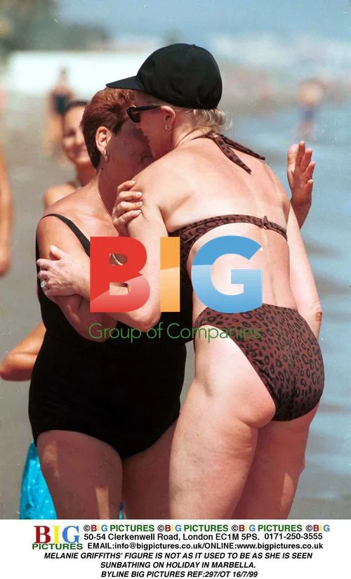 Melanie Griffiths Sunbathing on Holiday in Marbella
