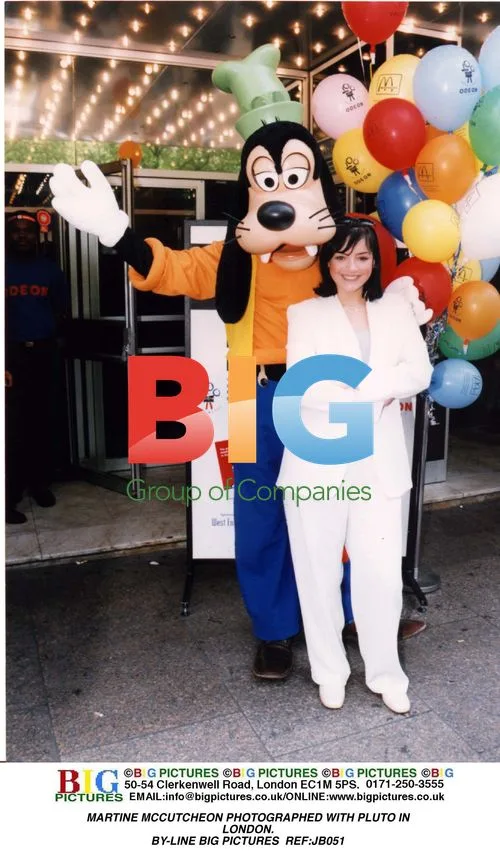 Martine McCutcheon poses with Pluto in London
