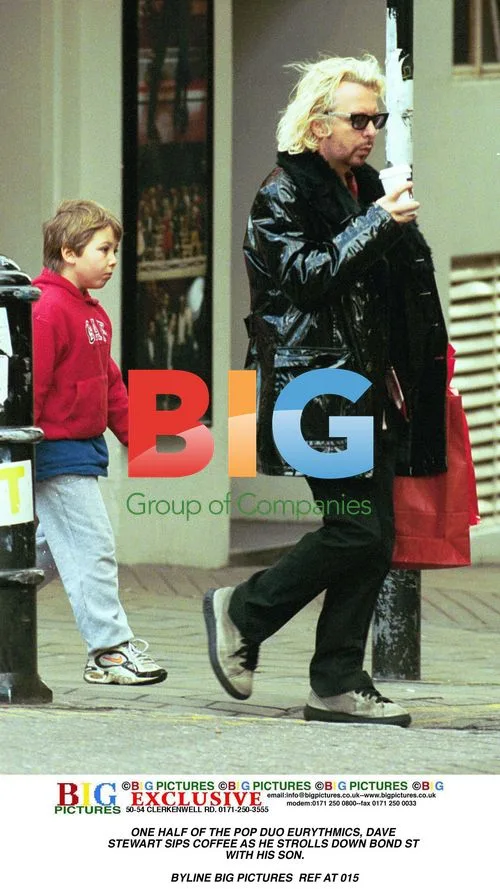 Dave Stewart Strolls with Son on Bond St