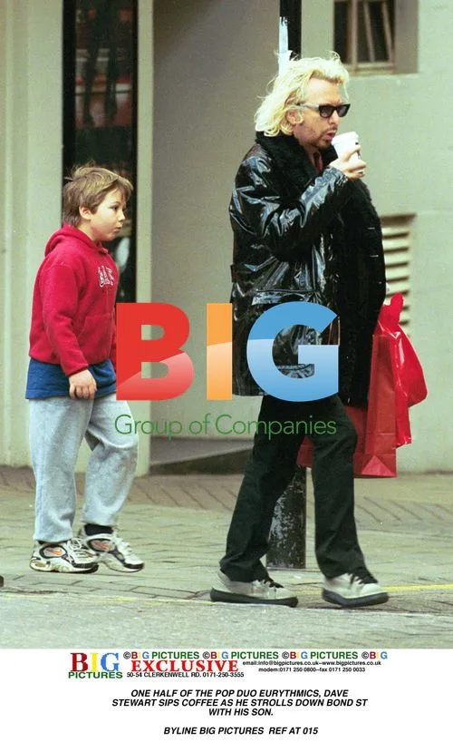 Dave Stewart Walks With Son on Bond St