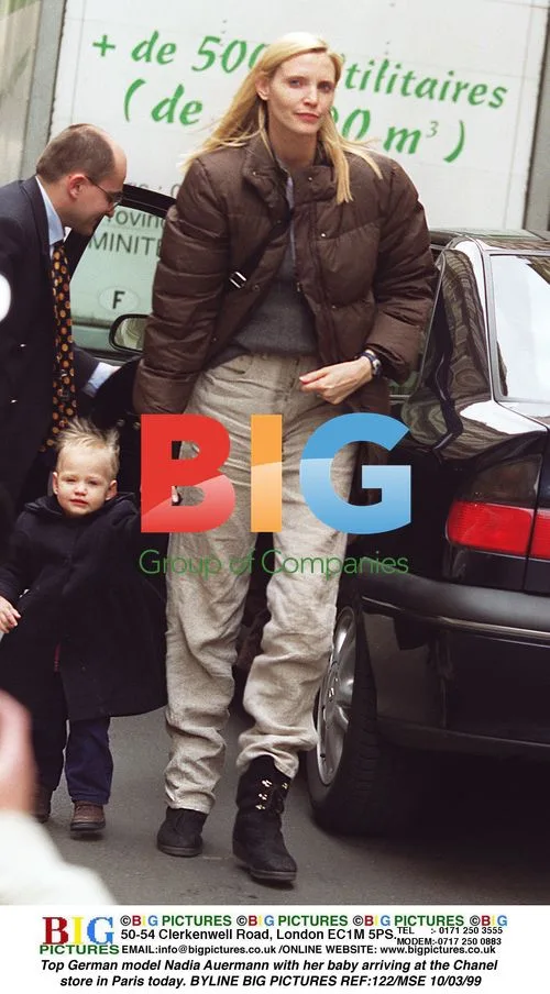 Nadia Auermann and baby arrive at Chanel in Paris