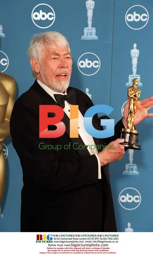 James Coburn Backstage at 71st Academy Awards