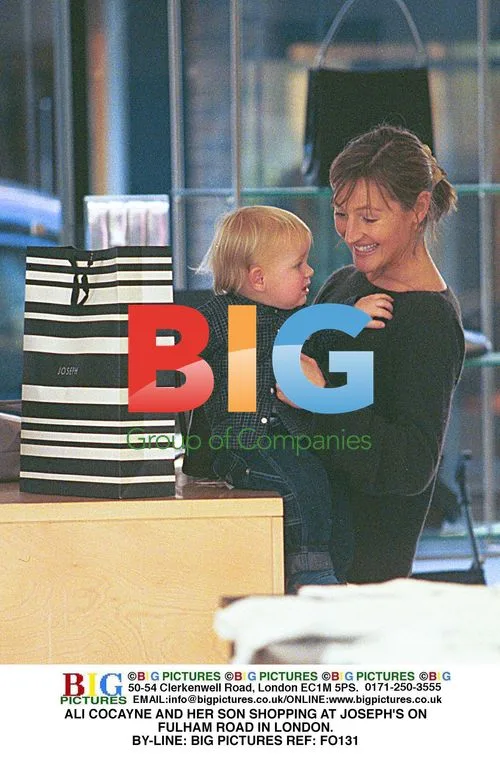 Ali Cocayne and son shopping in London