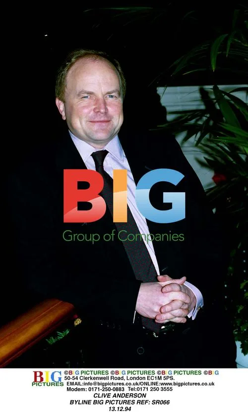Clive Anderson in black suit
