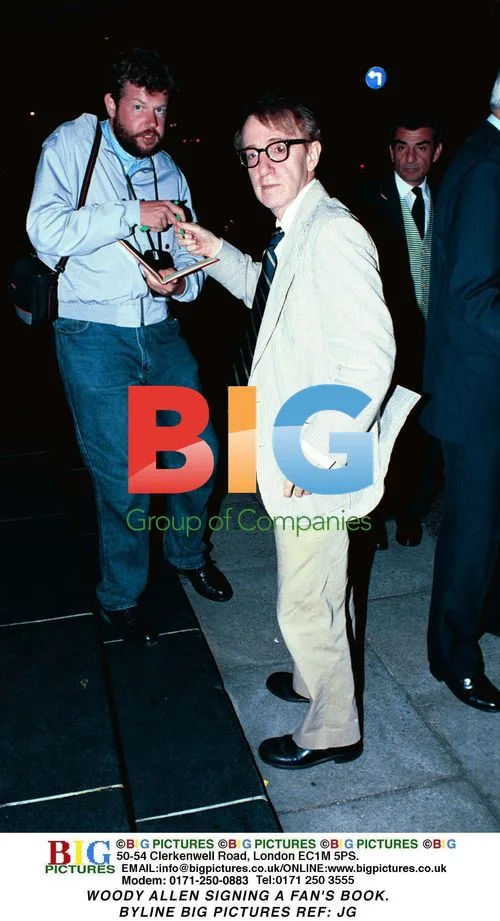 Woody Allen Signing Fan's Book