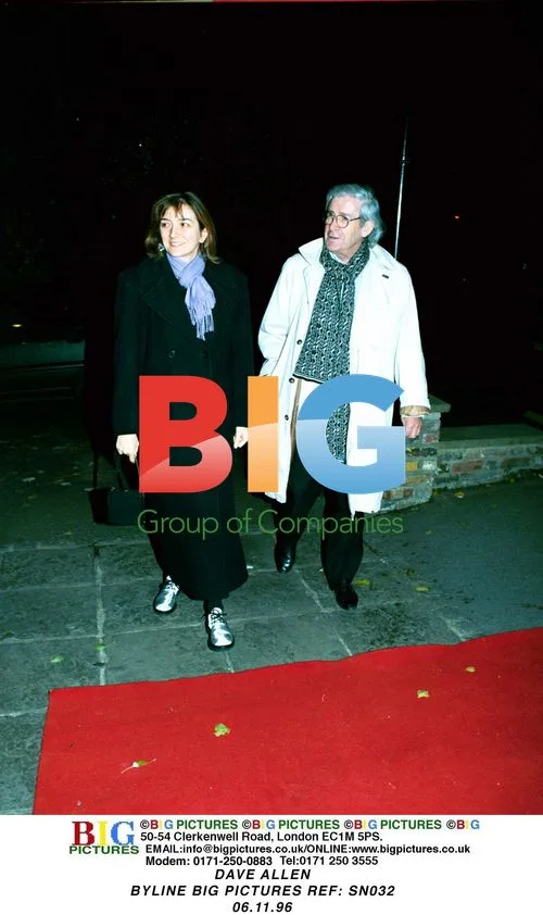 Dave Allen, White Coat and Pattern Scarf
