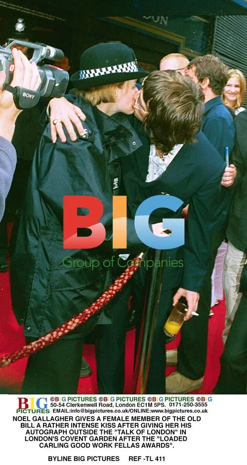 Noel Gallagher kisses police officer