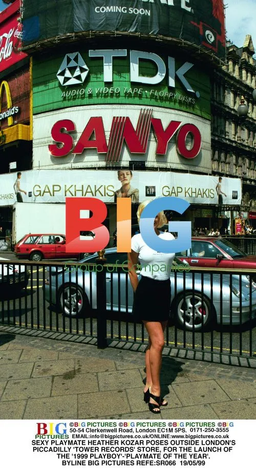PLAYMATE HEATHER KOZAR POSES AT LONDON'S 'TOWER RECORDS'