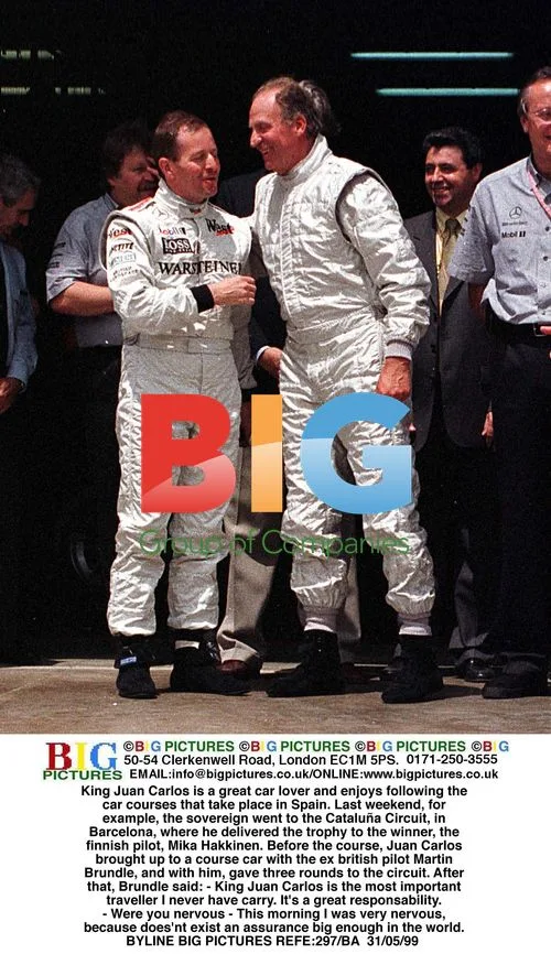 King Juan Carlos Drives Circuit with Pilot Mika Hakkinen