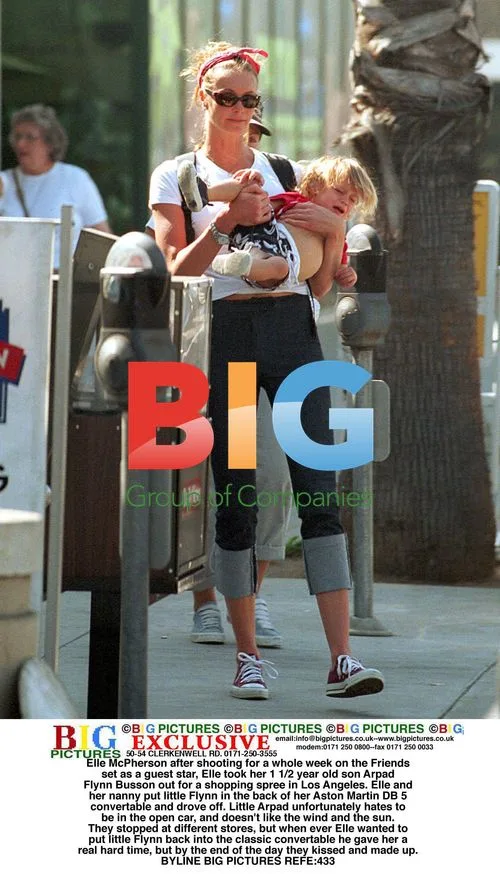 Elle McPherson and son go shopping