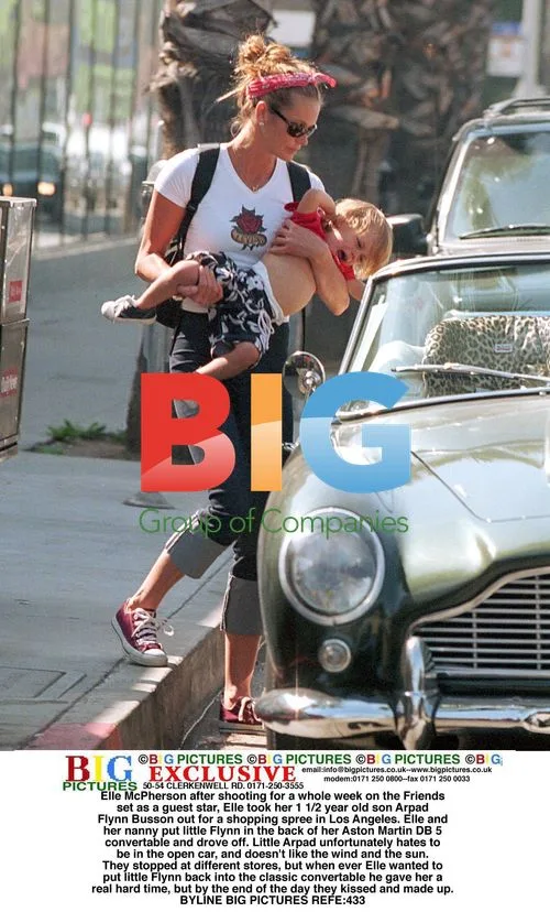 Elle McPherson out shopping with son