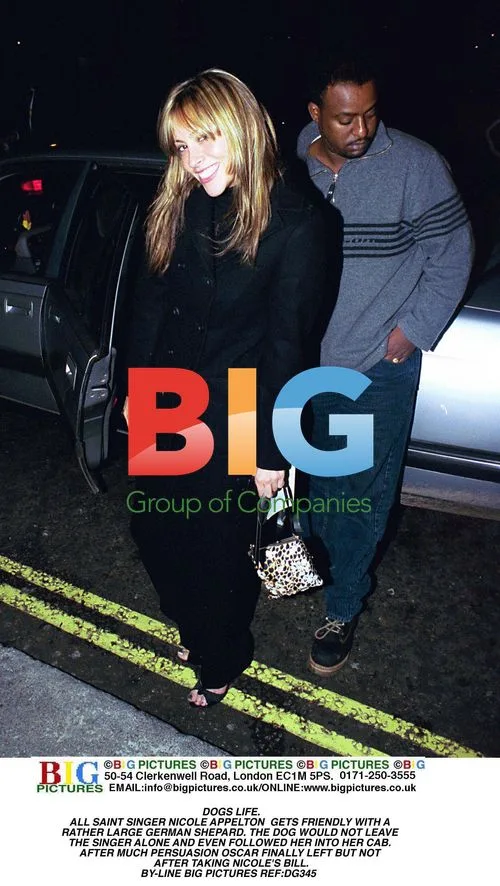 Nicole Appleton and Large German Shepherd