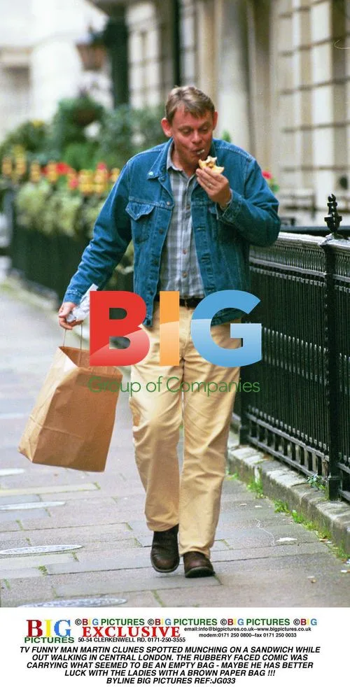 Martin Clunes Spotted Eating Sandwich