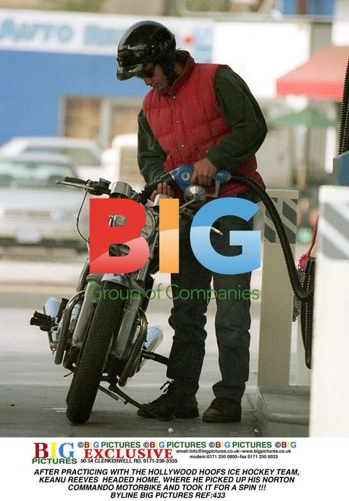 Keanu Reeves on his motorbike after ice hockey