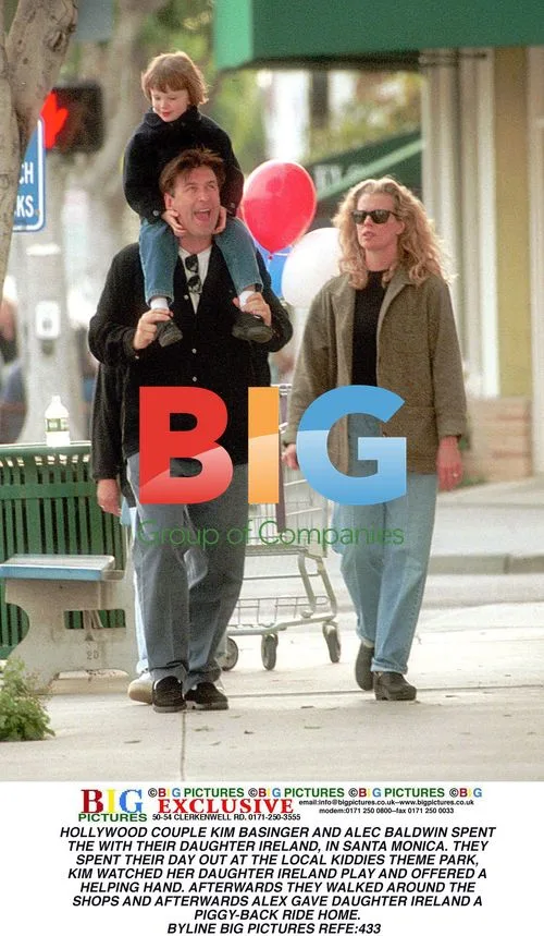 Kim Basinger and Alec Baldwin with Daughter