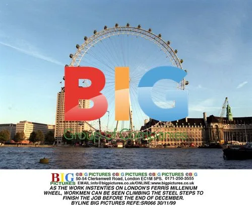 Workmen Climb London's Millennium Wheel