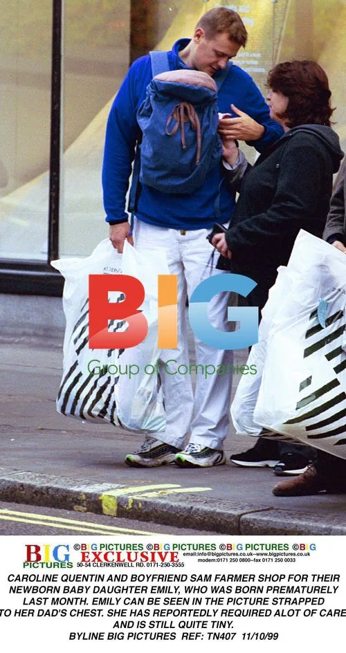 Caroline Quentin and Boyfriend Shop for Baby