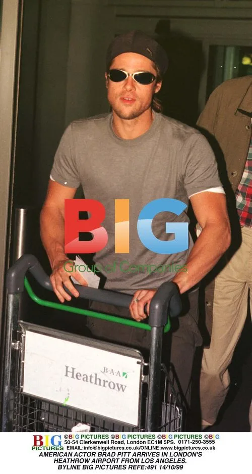 Brad Pitt arrives at Heathrow from LA