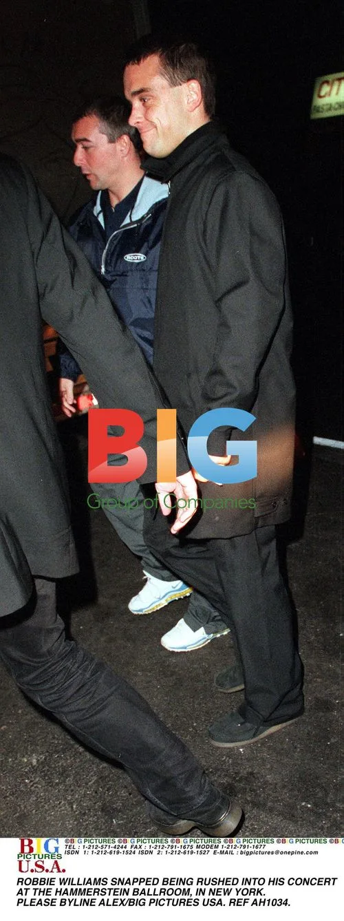 Robbie Williams Rushed to Concert in NY