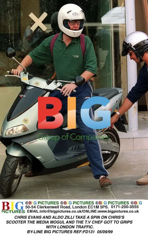Chris Evans and Aldo Zilli Ride Scooter in London