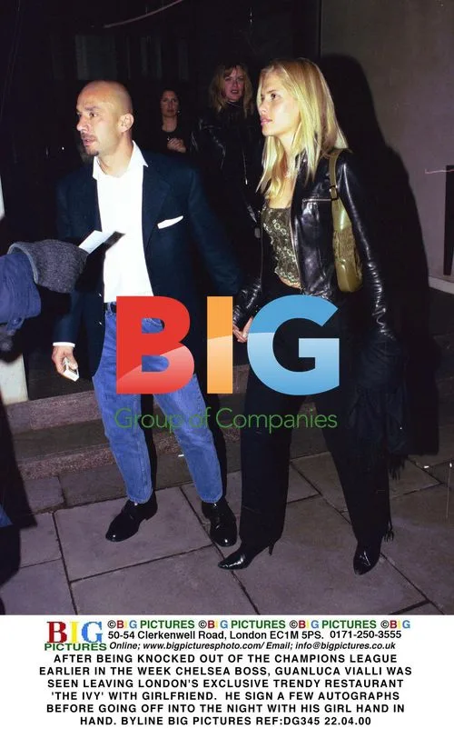 Vialli Leaves London Restaurant with Girlfriend