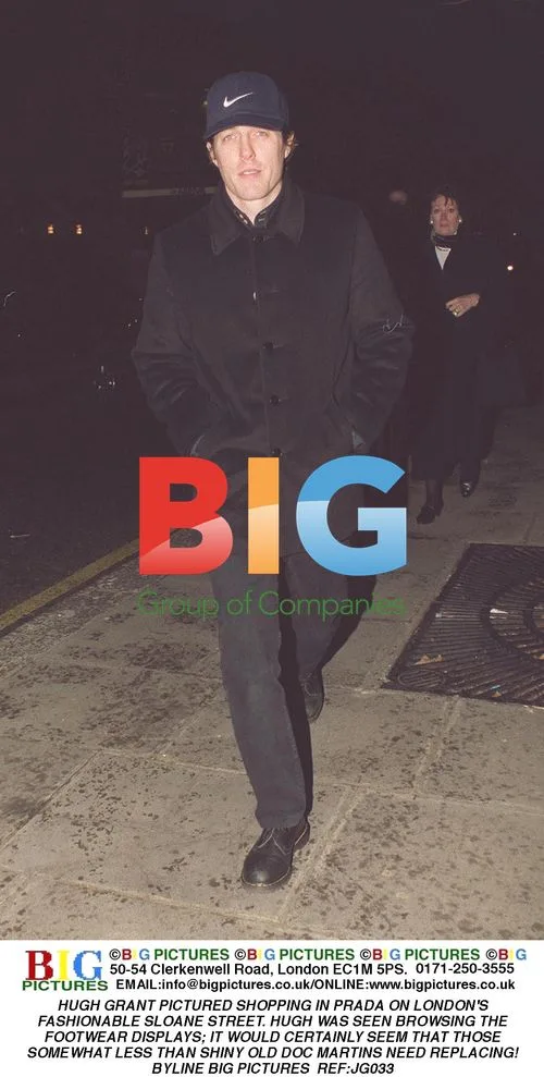 HUGH GRANT SPOTTED SHOPPING AT PRADA IN LONDON