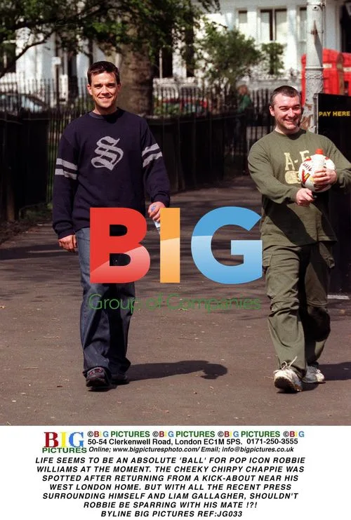 Robbie Williams Enjoys Football Near Home