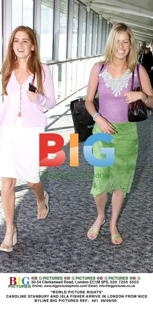 Caroline Stanbury and Isla Fisher Arrive in London