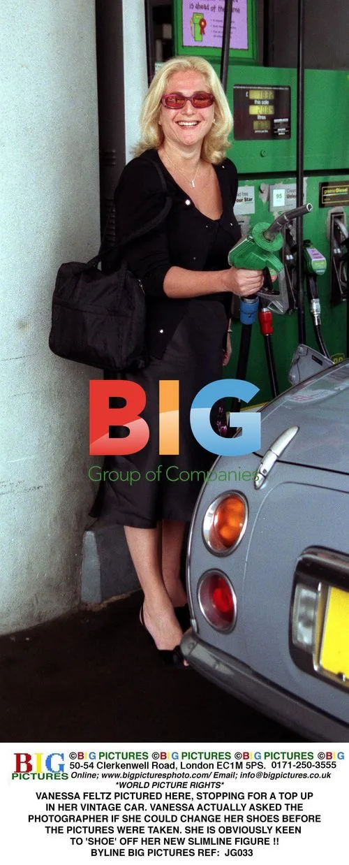 Vanessa Feltz Poses with Vintage Car