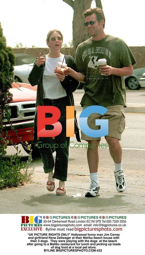 Jim Carrey and Rene Zellweger at Malibu beach