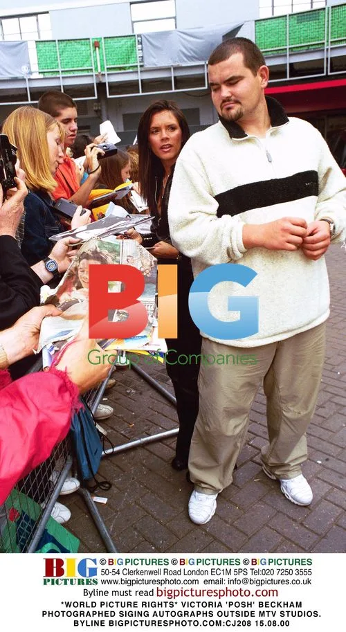Victoria 'Posh' Beckham Signing Autographs