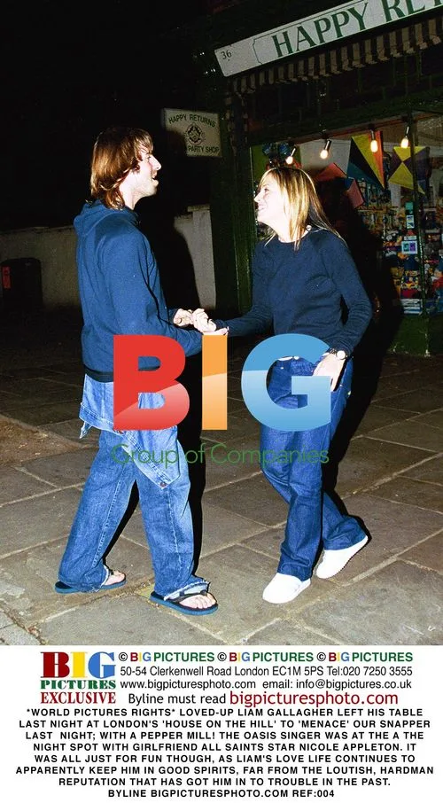 Liam Gallagher Playfully 'Menaces' Photographer