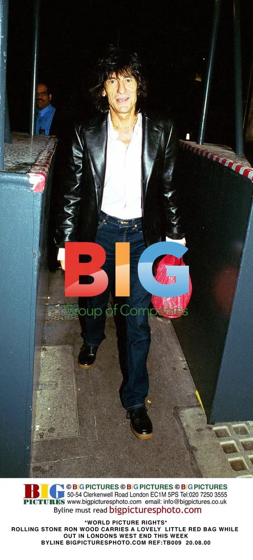 Ron Wood Carries Red Bag in London