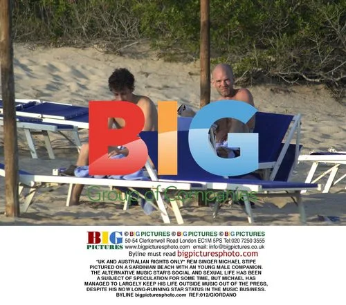 REM Singer Michael Stipe on Sardinian Beach