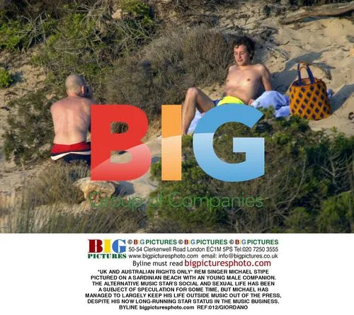 Michael Stipe Pictured with Male Companion on Sardinian Beach