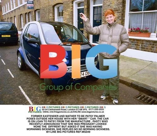 Patsy Palmer Poses with 'Smart' Car