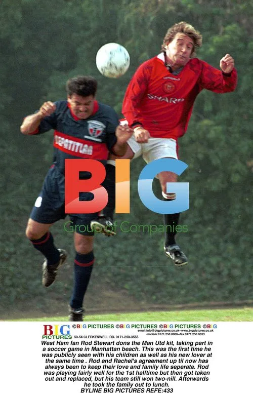 Rod Stewart plays soccer in Man Utd kit