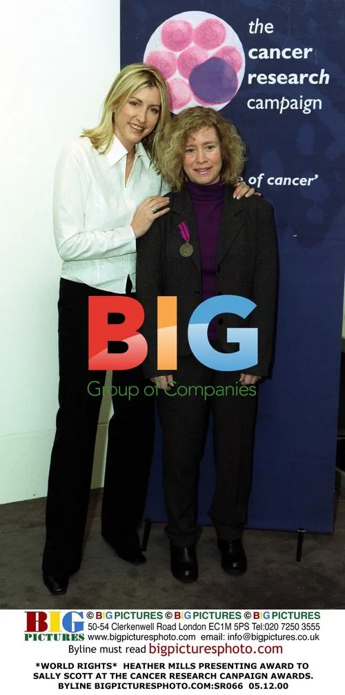 Heather Mills presents award to Sally Scott