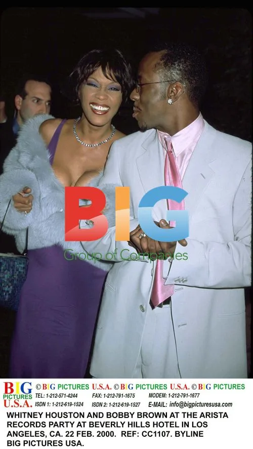 WHITNEY HOUSTON and BOBBY BROWN at Arista Party