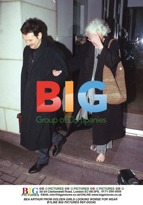 Bea Arthur Worse for Wear in Brown Coat
