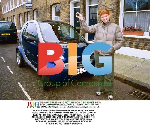 Patsy Palmer Poses with Loaned Smart Car