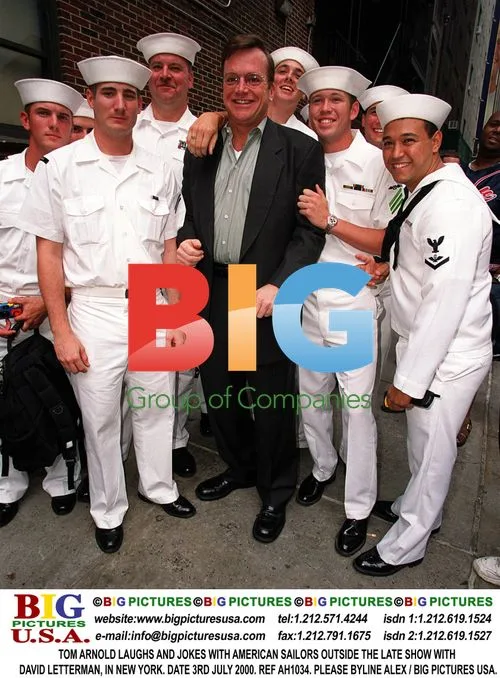 Tom Arnold Laughs with American Sailors