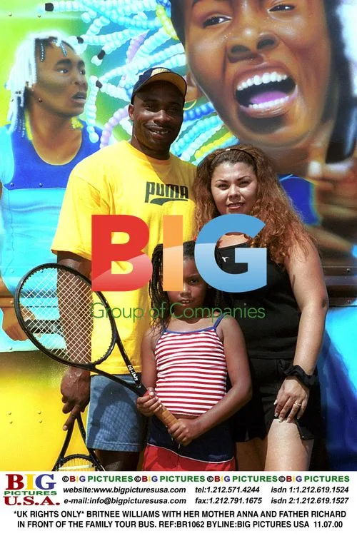 BRITNEE WILLIAMS with family tour bus