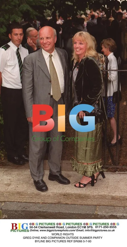 Greg Dyke and Companion Outside Summer Party