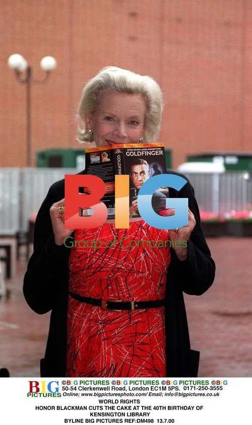 Honor Blackman Cuts Kensington Library Cake