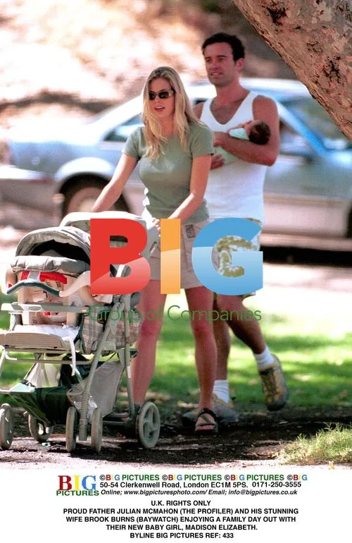 Julian McMahon and Brook Burns with baby daughter