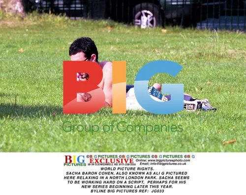 Sacha Baron Cohen Relaxing in Park