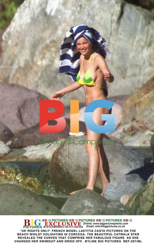 Laetitia Casta on beach in Corcega
