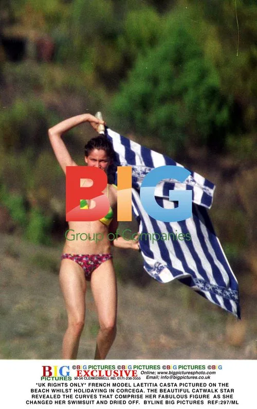 Laetitia Casta on Beach in Corcega
