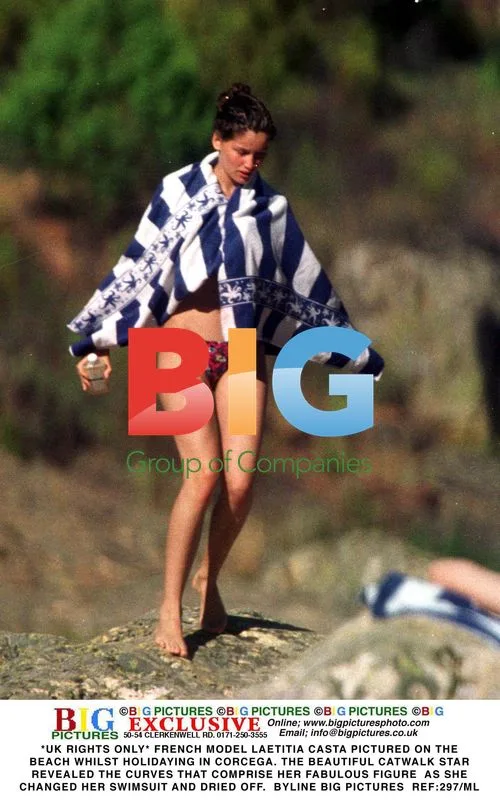 Laetitia Casta Topless on Beach in Corcega